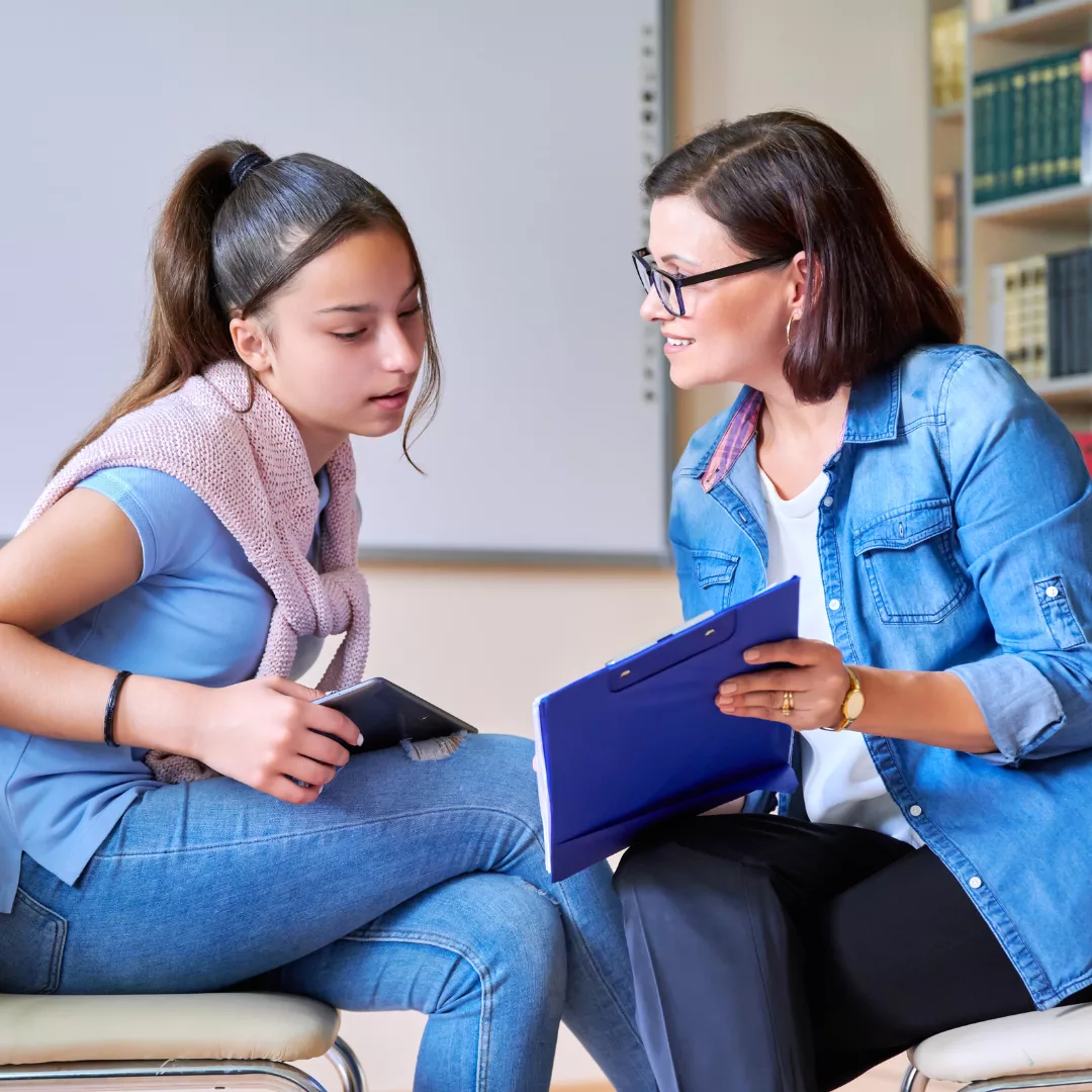 Parent talking to their teen about future career goals